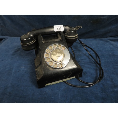 533 - A vintage Bakerlite telephone.