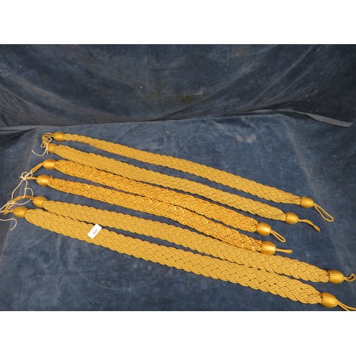 537 - Six braided curtain tiebacks.