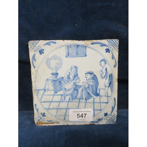 547 - An antique blue and white pottery tile.