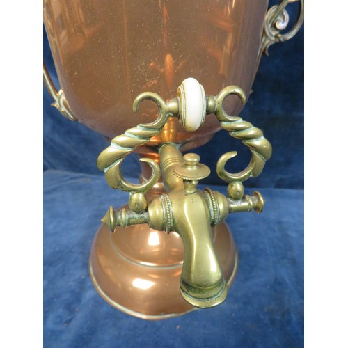 578 - A brass and copper 2-handled lidded Samovar.