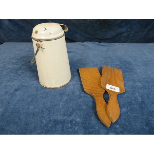 588 - A pair of wooden butter pats and an enamelled flask.