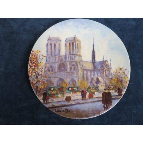 601 - Three collectors plates depicting city scenes in Paris.