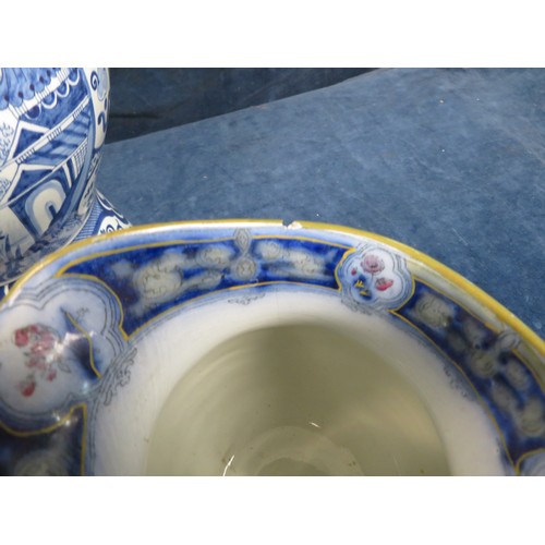 604 - An 'East Anglia Empire Ware' blue and white jug, a blue and white covered jar and another jug.