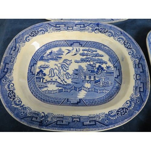 617 - Seven 19th century stoneware willow pattern platters and plates together with a 1959 llangowlen eist... 