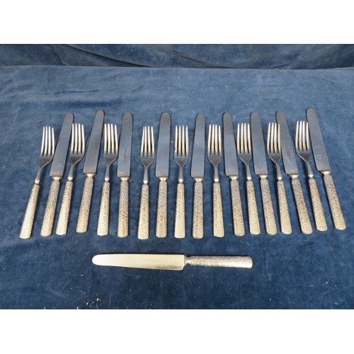 618 - A set of 20th century pennyweight silver plated cutlery comprising ten meat knives and nine forks.