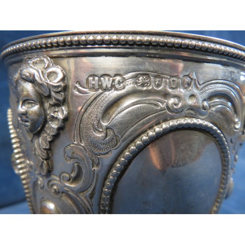 264 - An embossed silver goblet by Henry William Curry, hallmarked London 1869, weighing approximately 10 ... 