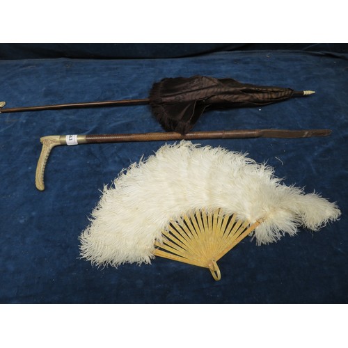 443 - A vintage Parasol, Riding Crop and Feathered Fan.