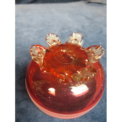 622 - Four pieces of cranberry glass being small heart shaped dish on shell style feet, cream jug on shell... 