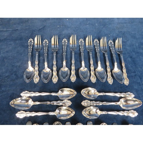 628 - A box of silver plated 20th century flatware, including 23 serving spoons, 13 dessert spoons, 16 mix... 