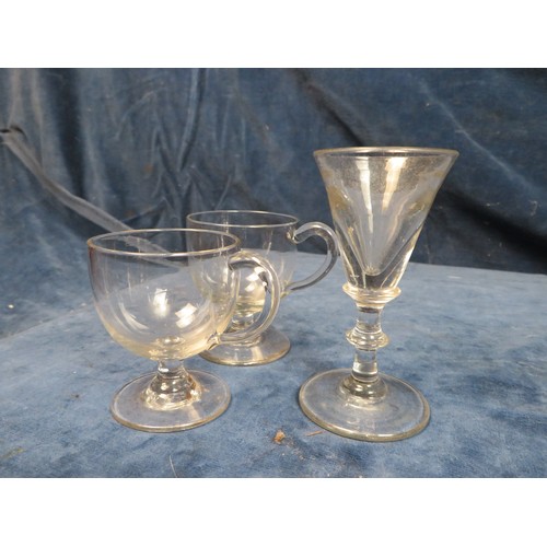 633 - Two early 19th century pedestal rummer glasses with faceted stems, 15cm tall (one with chip to rim) ... 