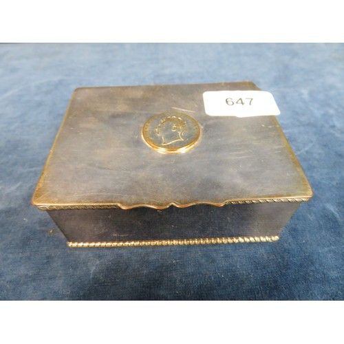 647 - A 20th century silver plated desk cigarette box inset with coin stamped 1821.