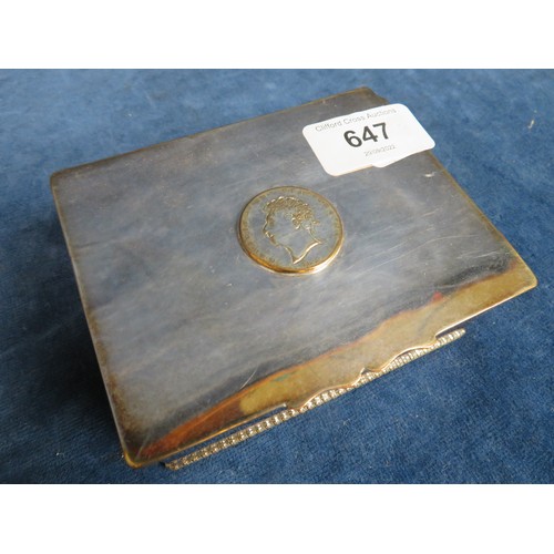 647 - A 20th century silver plated desk cigarette box inset with coin stamped 1821.