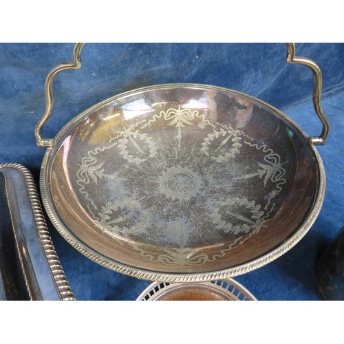 653 - A sundry silver plated items including entrée dish and cover, fruit basket with swag decoration and ... 