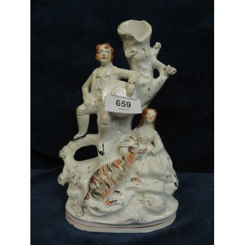 659 - A flatback vase depicting lady and gentleman with animal A/F.