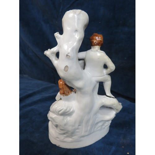 659 - A flatback vase depicting lady and gentleman with animal A/F.