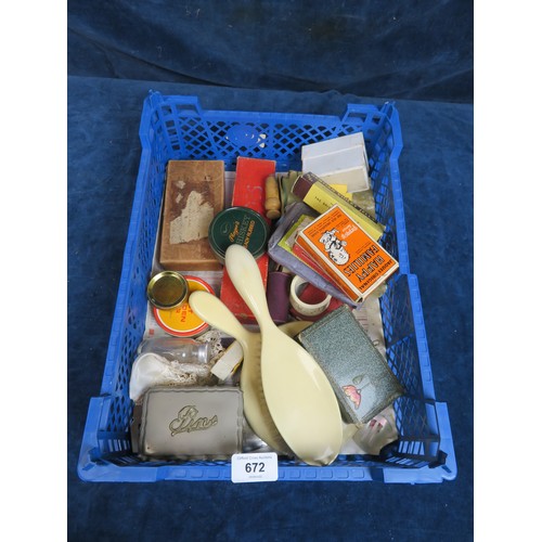 672 - A tray of collectables including, glass pin box, dressing mirror and brush, bone napkin ring, playin... 