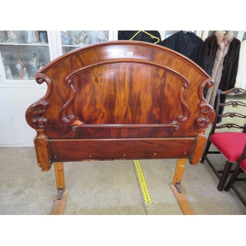 744 - A ornate walnut double bed headboard - 145cm x 135cm tall.