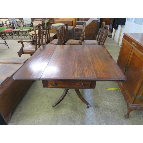 746 - An antique mahogany pedestal drop leaf table with single drawer on 4 splayed legs with brass claw fe... 