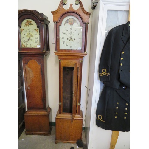 755 - An oak cased Grandfather Clock with hand painted Dial and Moon Roller.