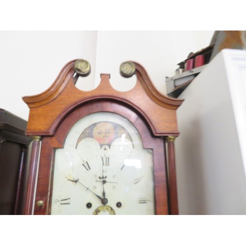 755 - An oak cased Grandfather Clock with hand painted Dial and Moon Roller.