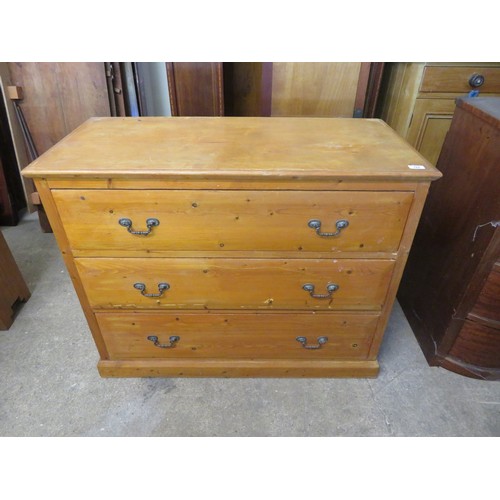 764 - A pine chest of 3 long drawers.