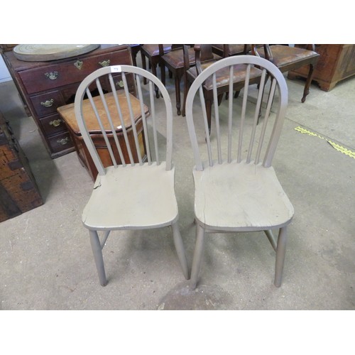 772 - A pair of Windsor style single chairs.