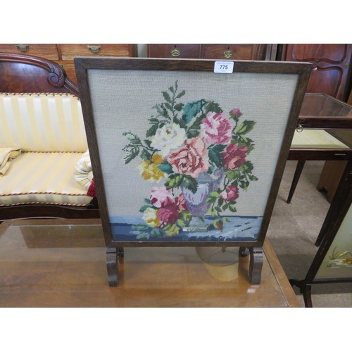 775 - A vintage oak framed fire screen with glazed and tapestry panel.