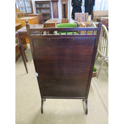 779 - A vintage mahogany framed fire screen with glazed and silk needlepoint bird panel and acorn finials.