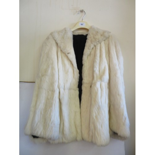 683 - A vintage white fur jacket.