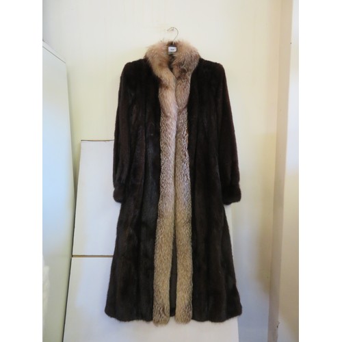 684 - A vintage brown fur coat with a 