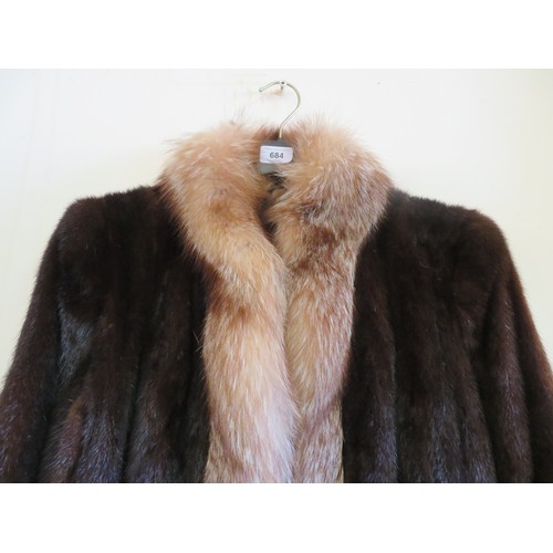 684 - A vintage brown fur coat with a 