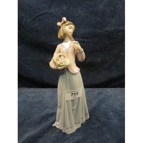 715 - A Lladro figurine of a girl with flower basket in hand.