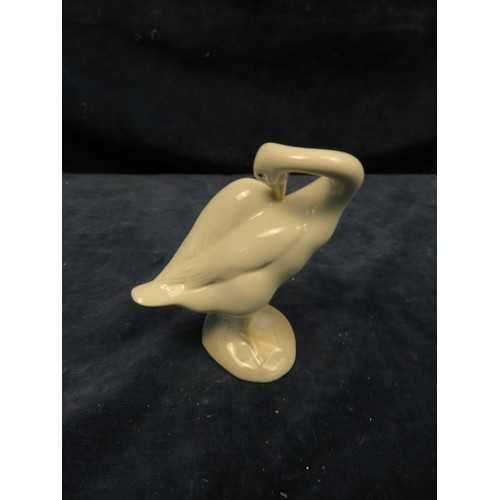 717 - A Lladro figurine of a goose.