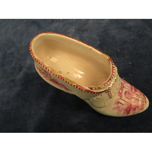 724 - A most unusual 18th century Dutch pottery shoe with hand painted castle ruin, boat and sea shore sce... 