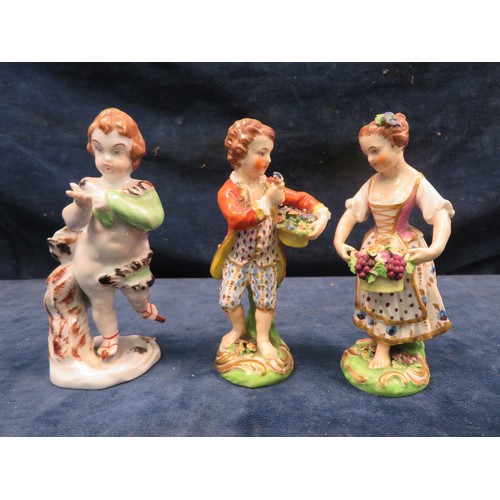 725 - A pair of antique figurines depicting 'Girl with Basket of Flowers' and 'Boy with Flowers', and an a... 