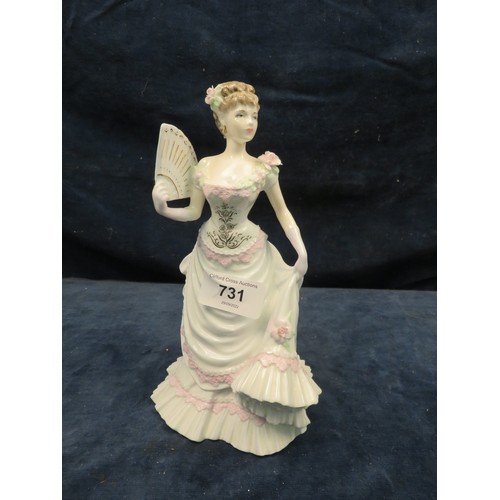 731 - A Coalport figurine from the Femmes Fatales Series being 'Lillie Langtry' number 5598 of 12,500 with... 