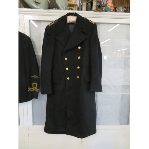 735 - A vintage naval overcoat.