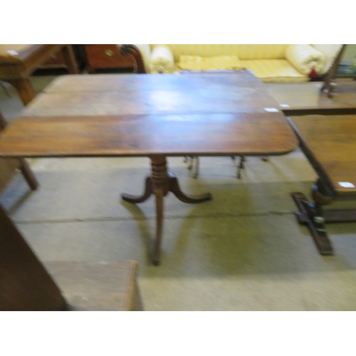 787 - An oak single drop leaf table on turned pedestal with 3 splayed legs.