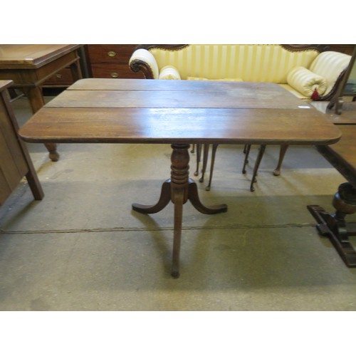 787 - An oak single drop leaf table on turned pedestal with 3 splayed legs.