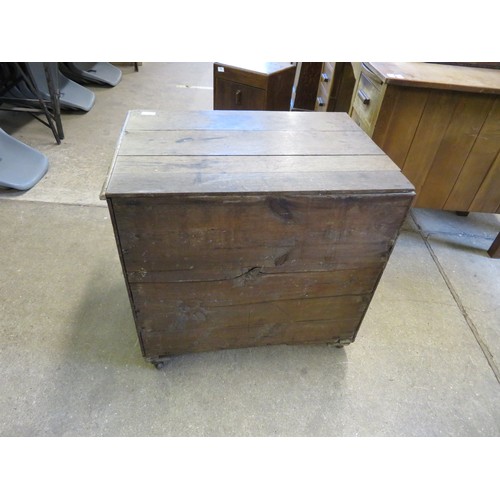 792 - An oak chest of 3 drawers on castors A/F.