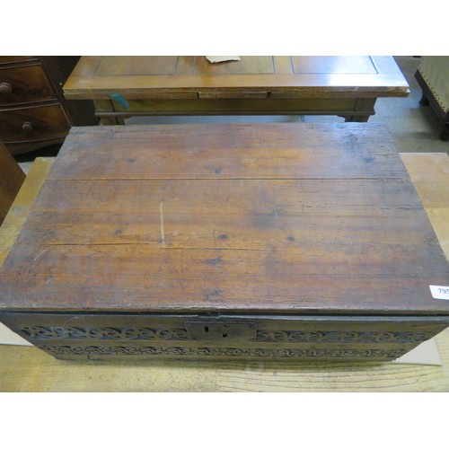 795 - An unusual antique trunk with carved front panel and 2 iron carrying handles, 70.5cm x 44.5cm x 28cm... 