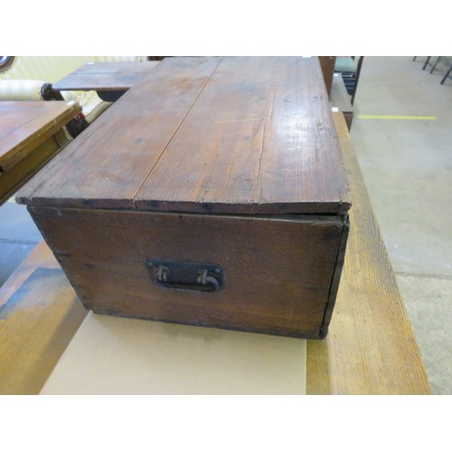 795 - An unusual antique trunk with carved front panel and 2 iron carrying handles, 70.5cm x 44.5cm x 28cm... 