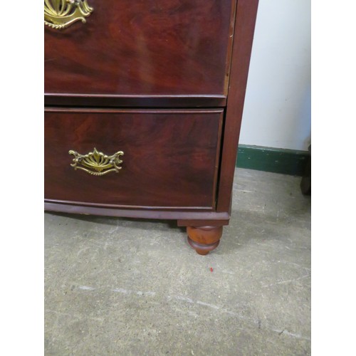 800 - An antique mahogany bow fronted chest of 2 short and 3 long drawers on turned bun feet with brass dr... 