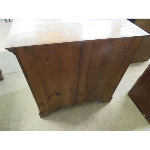 802 - An antique mahogany and inlaid chest of 4 long drawers with brass drop handles on shaped bracket fee... 