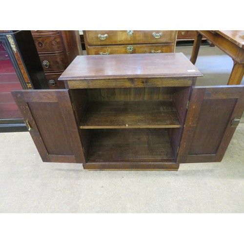 803 - A vintage oak 2 door cupboard.