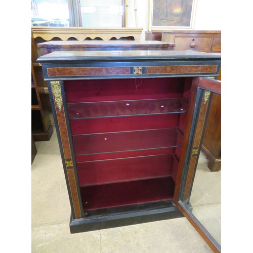 804 - An antique credenza with inlaid decoration and glazed door having red velvet interior and 3 glazed s... 