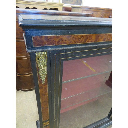 804 - An antique credenza with inlaid decoration and glazed door having red velvet interior and 3 glazed s... 