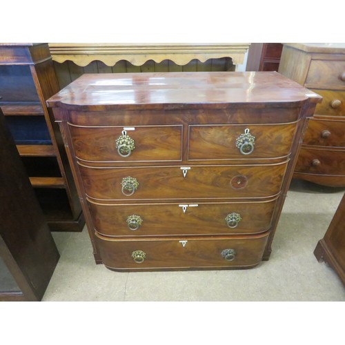 805 - An antique mahogany bow fronted chest of 2 short and 3 long drawers with ornate drop handles and ree... 