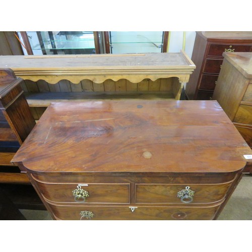 805 - An antique mahogany bow fronted chest of 2 short and 3 long drawers with ornate drop handles and ree... 