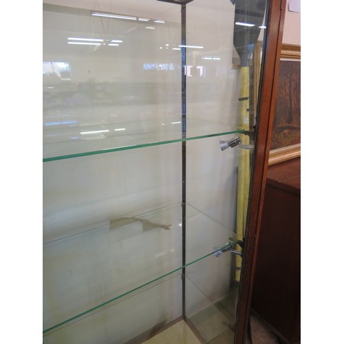 808 - A mahogany framed and glazed display unit with 3 glass shelves and fitted spot lights - 174.5cm wide... 